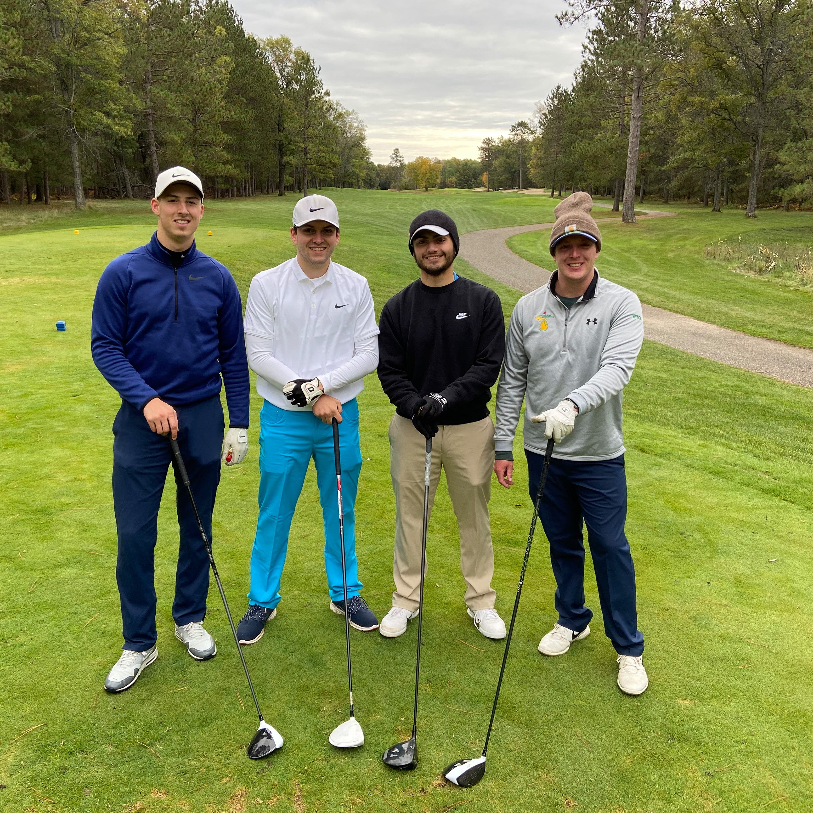 foursome group of golfers